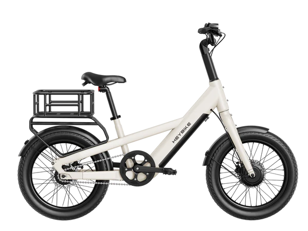White Heybike EC Compact City Electric Bike with black wheels and a small basket on a white background