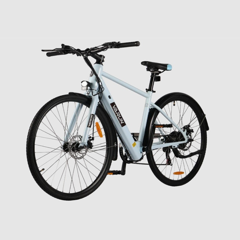 White VARUN C7007 Premium Commuter Electric bicycle on a light gray background - Pogo Cycles, Ireland