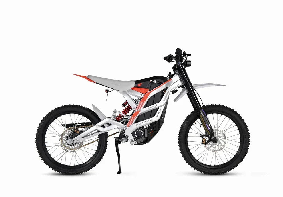 White 79BIKE Falcon Pro Electric Dirt Bicycle with black and orange accents on a white background - Pogo Cycles, Ireland